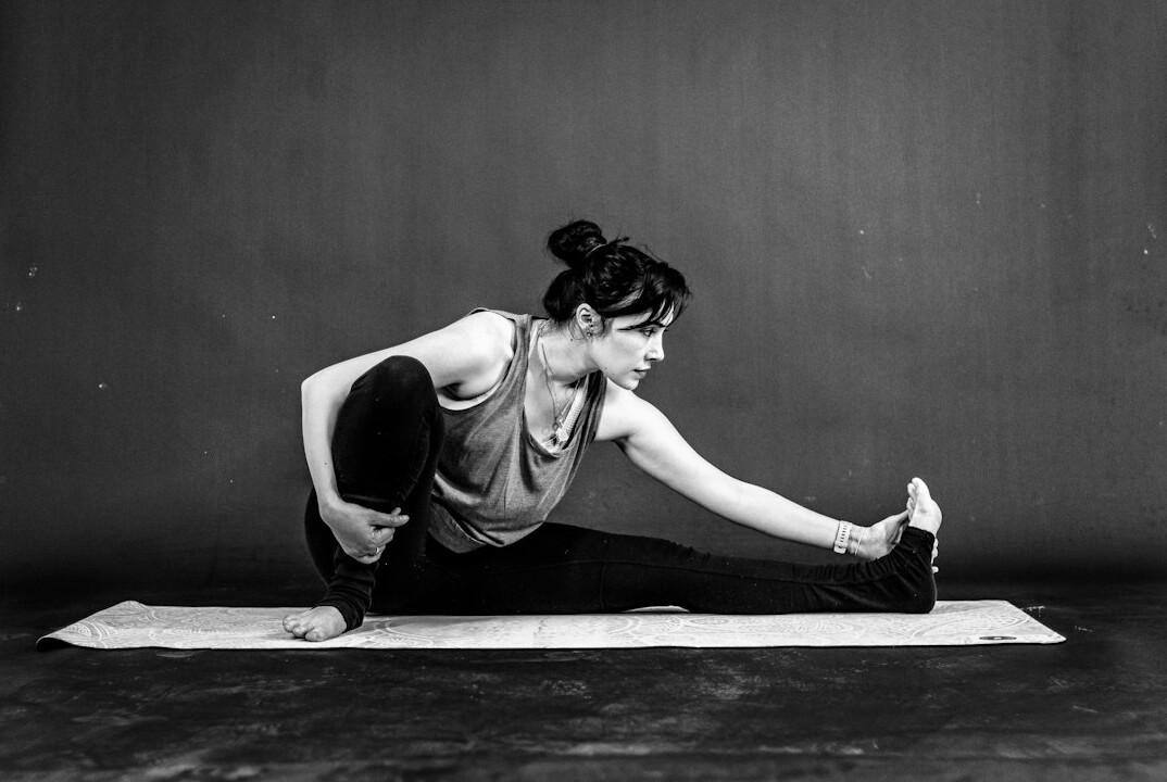 person stretching after workout